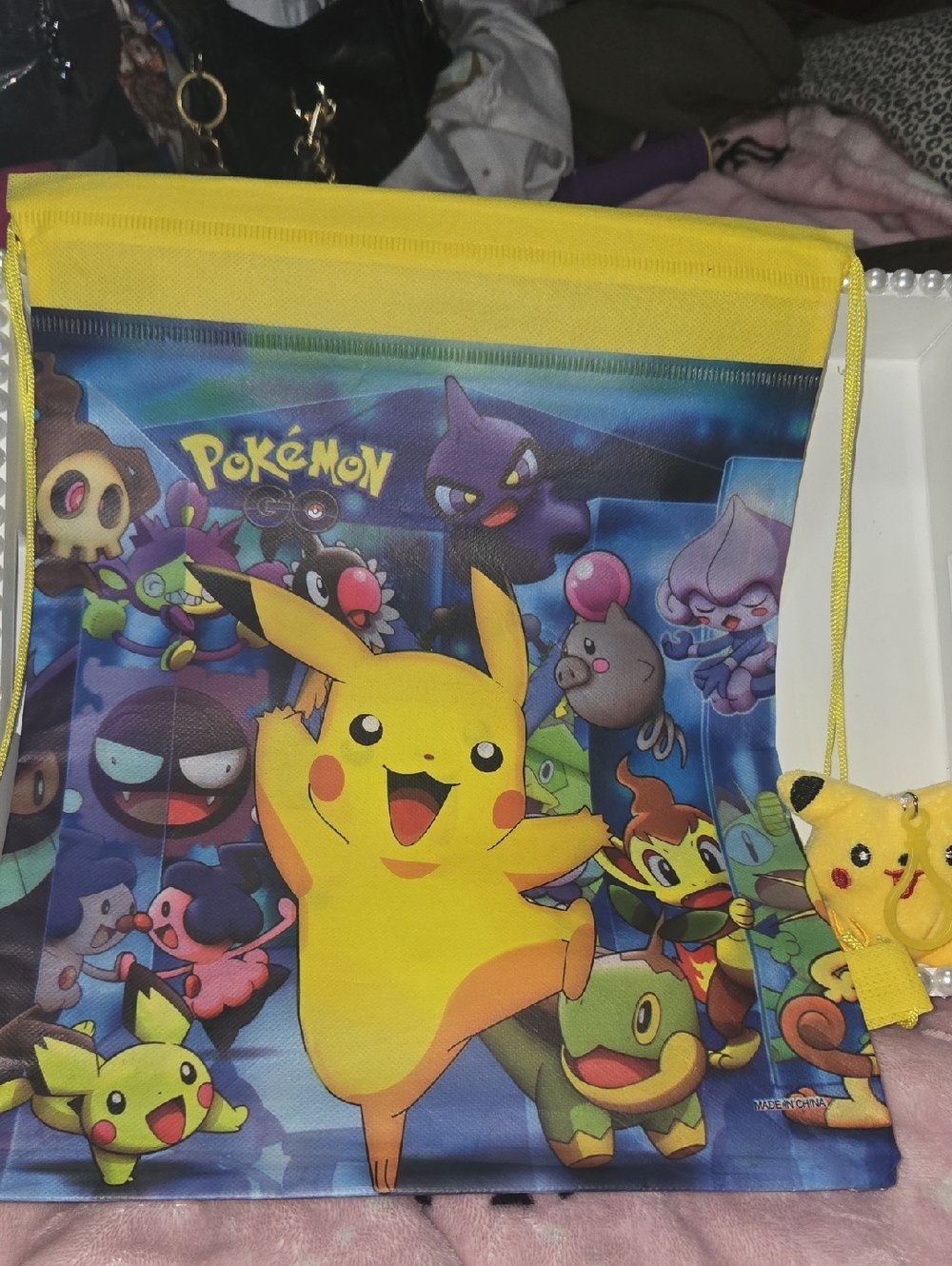 NEW..Pokémon Pikachu Drawstring Backpack - Yellow/Blue Witj Bag Charm
